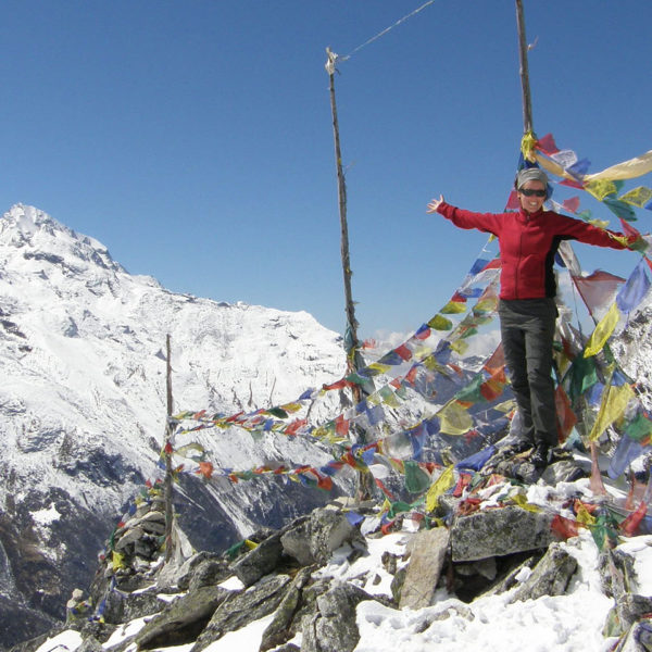 Trekker on top of Kyangjin Ri a view point in the Langtang valley