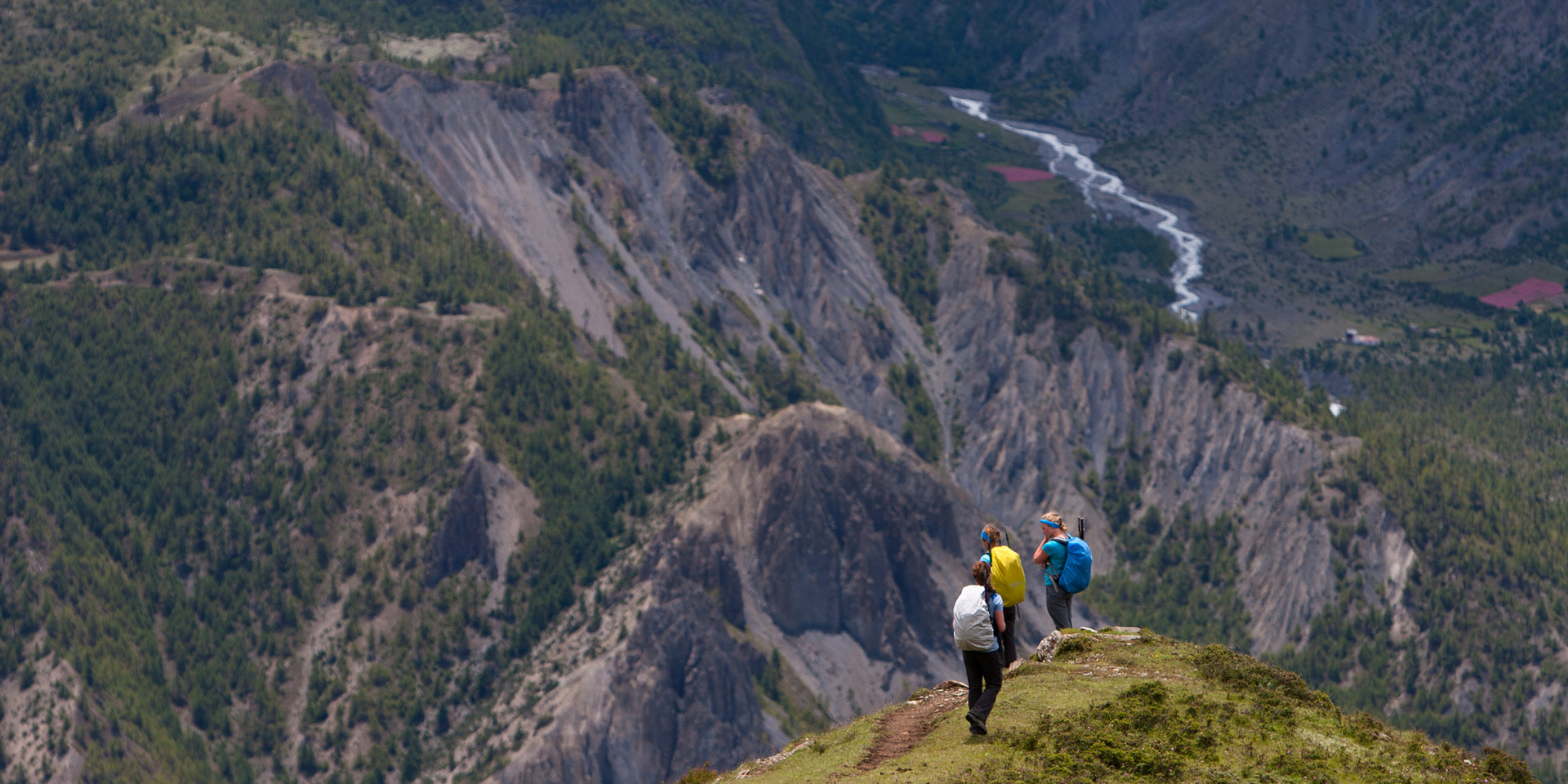 Trekkers descending from Kang La to Ngawal on the Annapurna Circuit