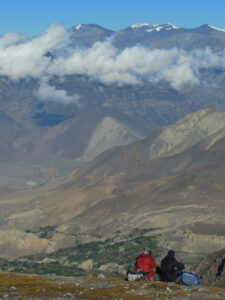 View down to lower Mustang valley from the trail descending from Thorung La