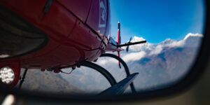 Looking through the rear view mirror of the Helicopter on the flight to Everest in Nepal