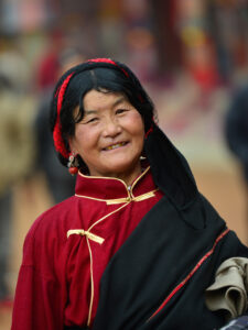 Tibetan pilgrim at the Boudhanath stupa in the Kathmandu valley, Nepal