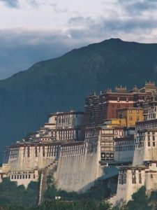 Lhasa's Potala Palace in the soft light of moody sunset skies